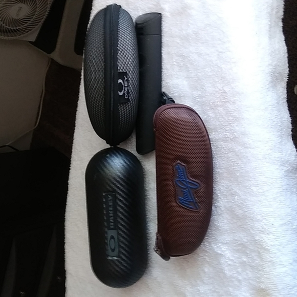 Three sunglass glass cases ..New never been used.